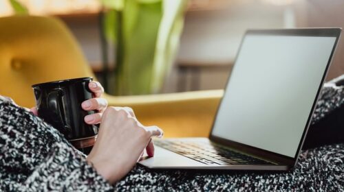 Woman checking the best platforms to monetize skills and make money online.