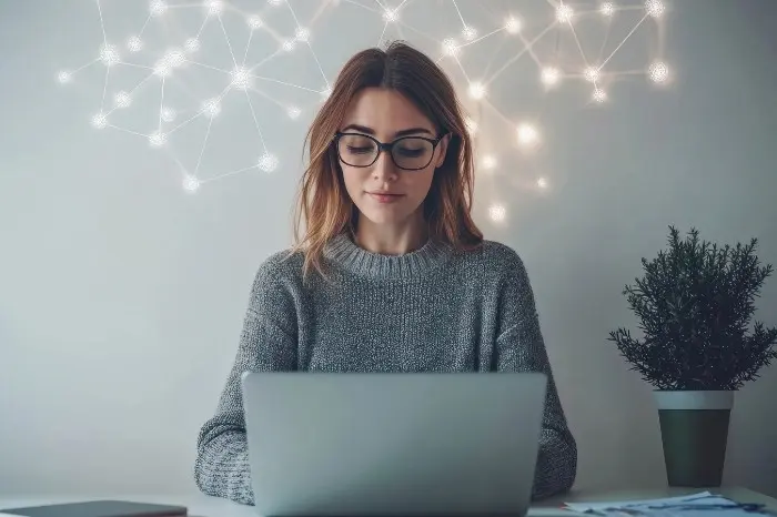 Woman searches on her laptop for the "best ways to make money from your laptop."