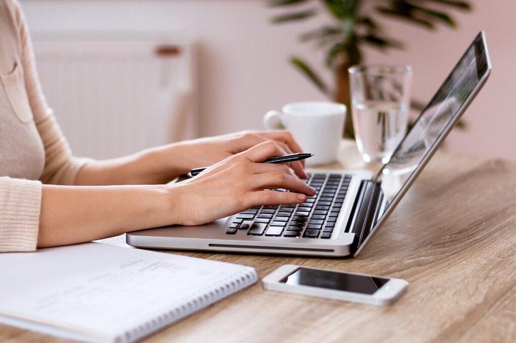 Woman working on her home office.